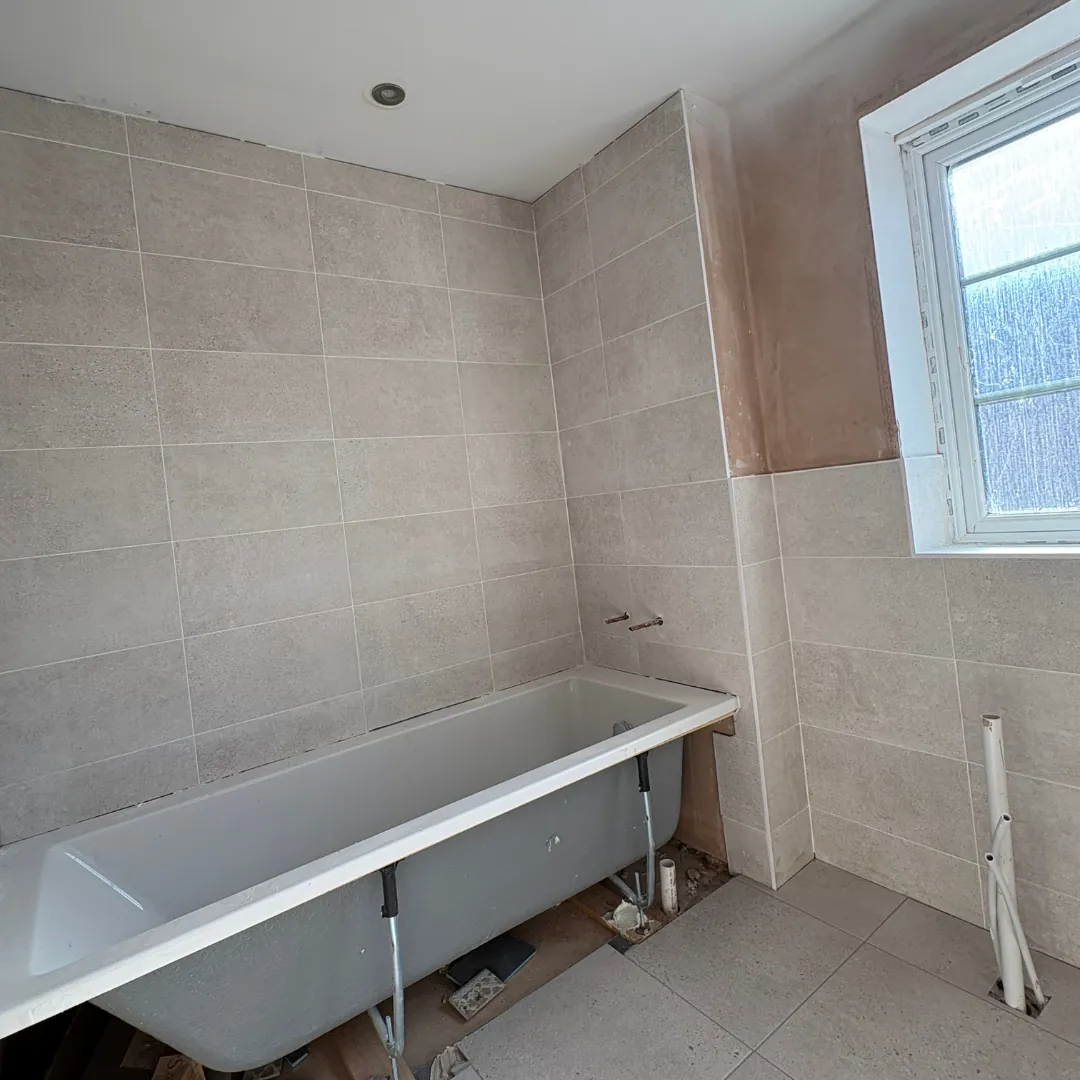Bathroom wall and floor tiling by LN Ceramics